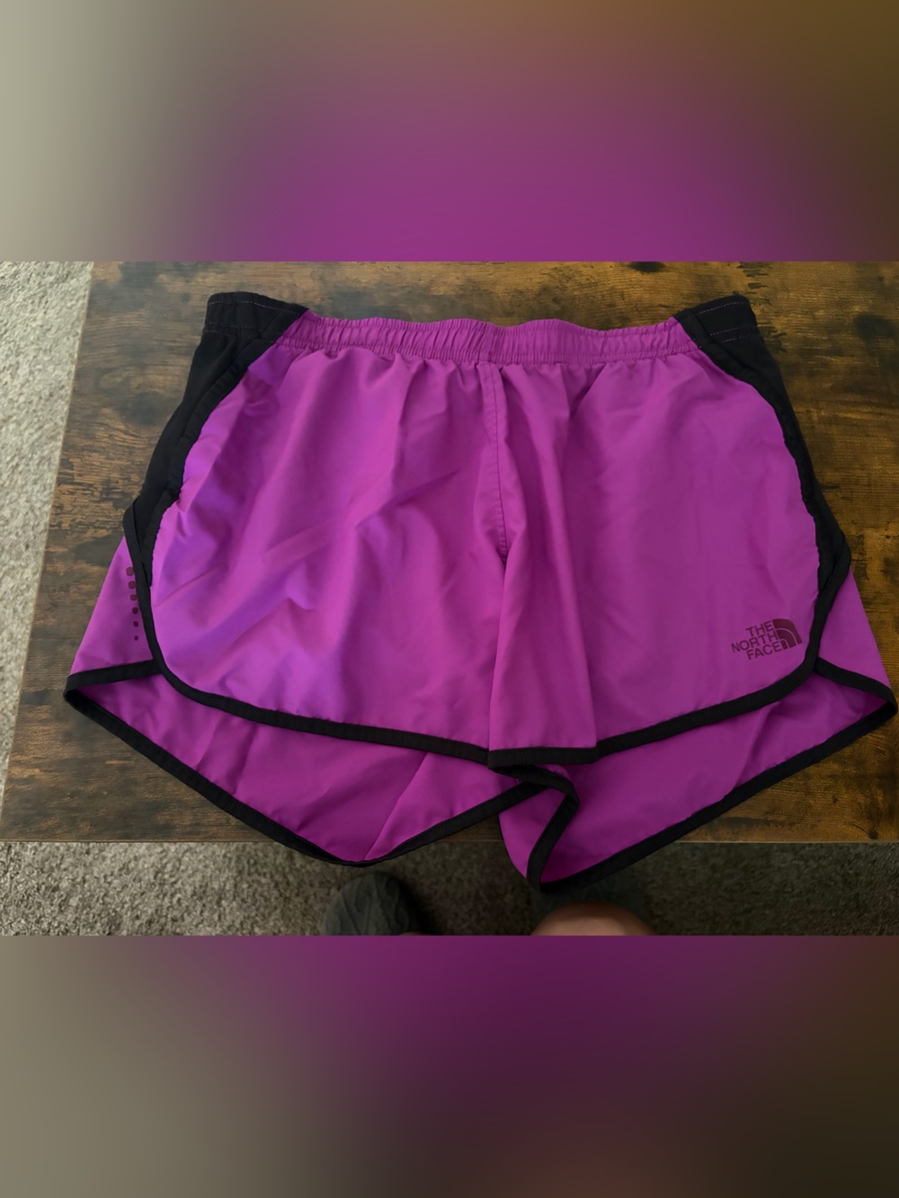 The North Face Women's Magenta Athletic Shorts with Black Trim
